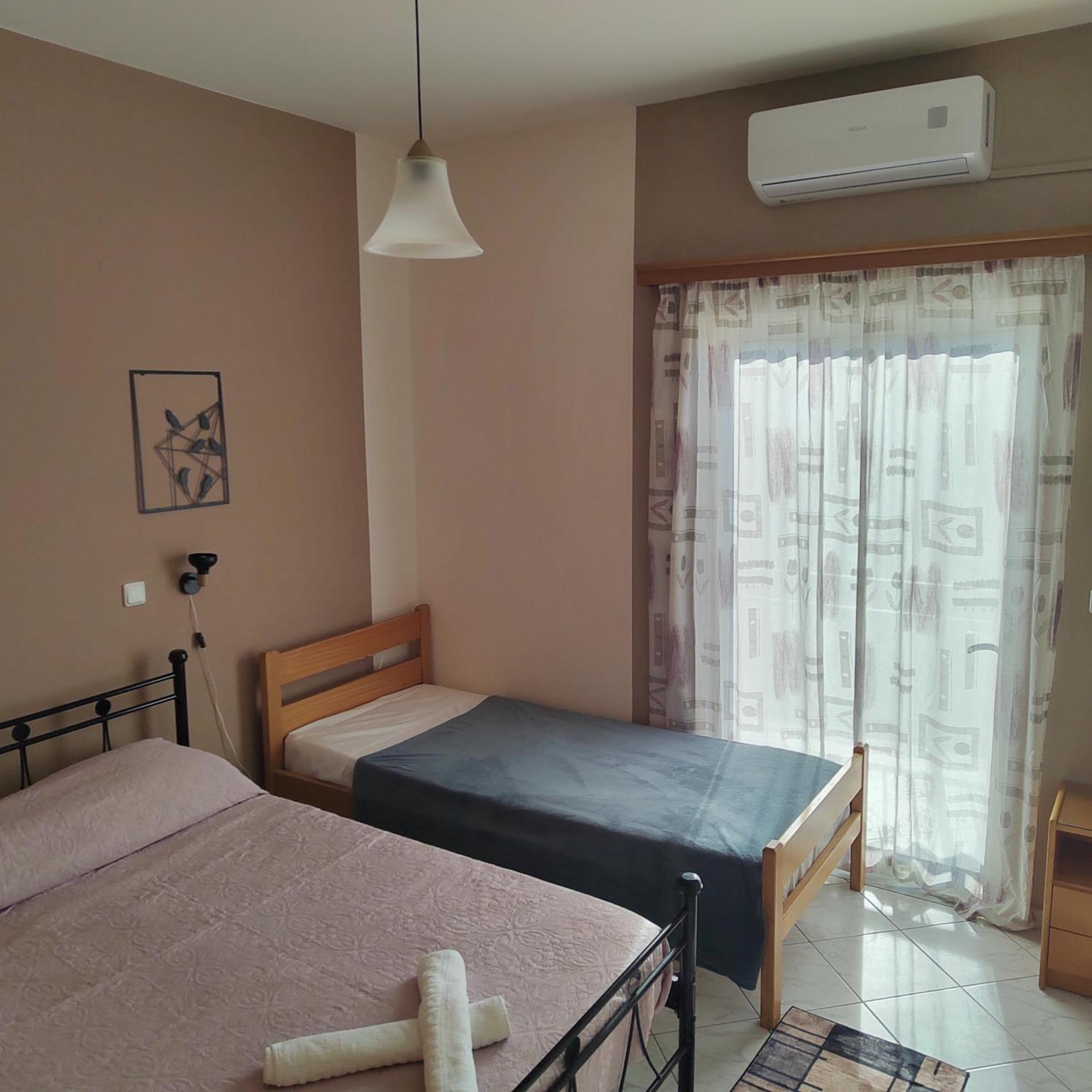 Manos Apartments Kolimvarion Bagian luar foto